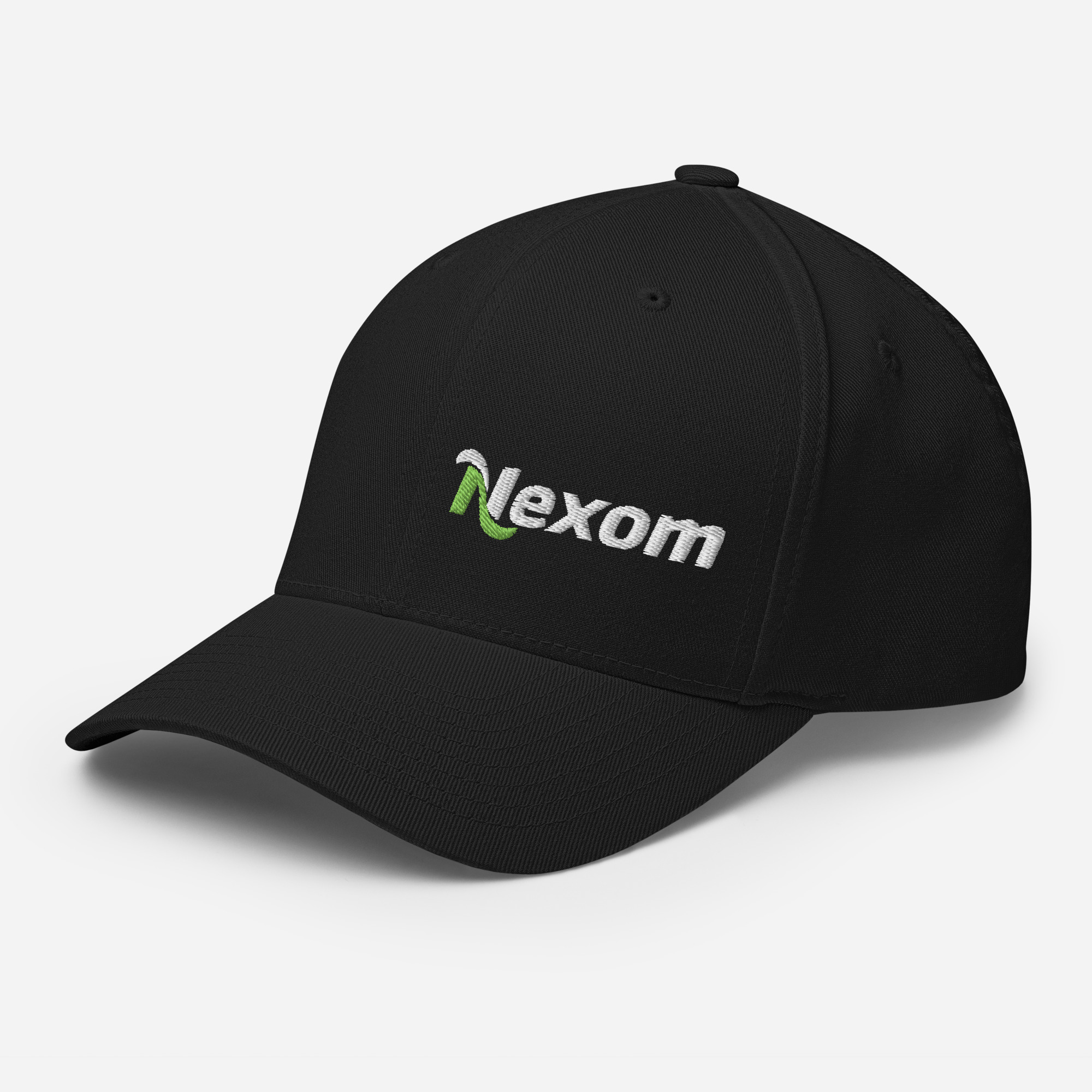 Side angle of closed-back Flexfit hat showing off-centre logo embroidery and curved visor in Black
