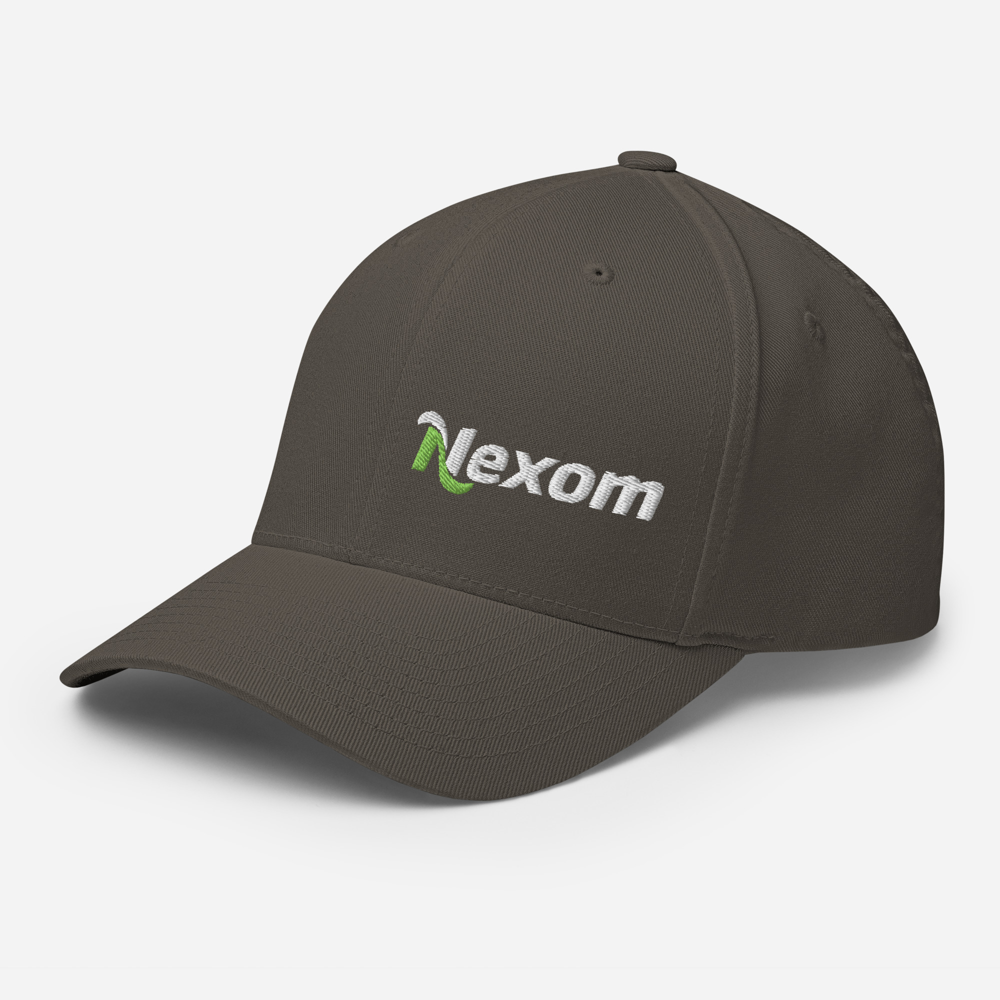 Side angle of closed-back Flexfit hat showing off-centre logo embroidery and curved visor in Dark Grey