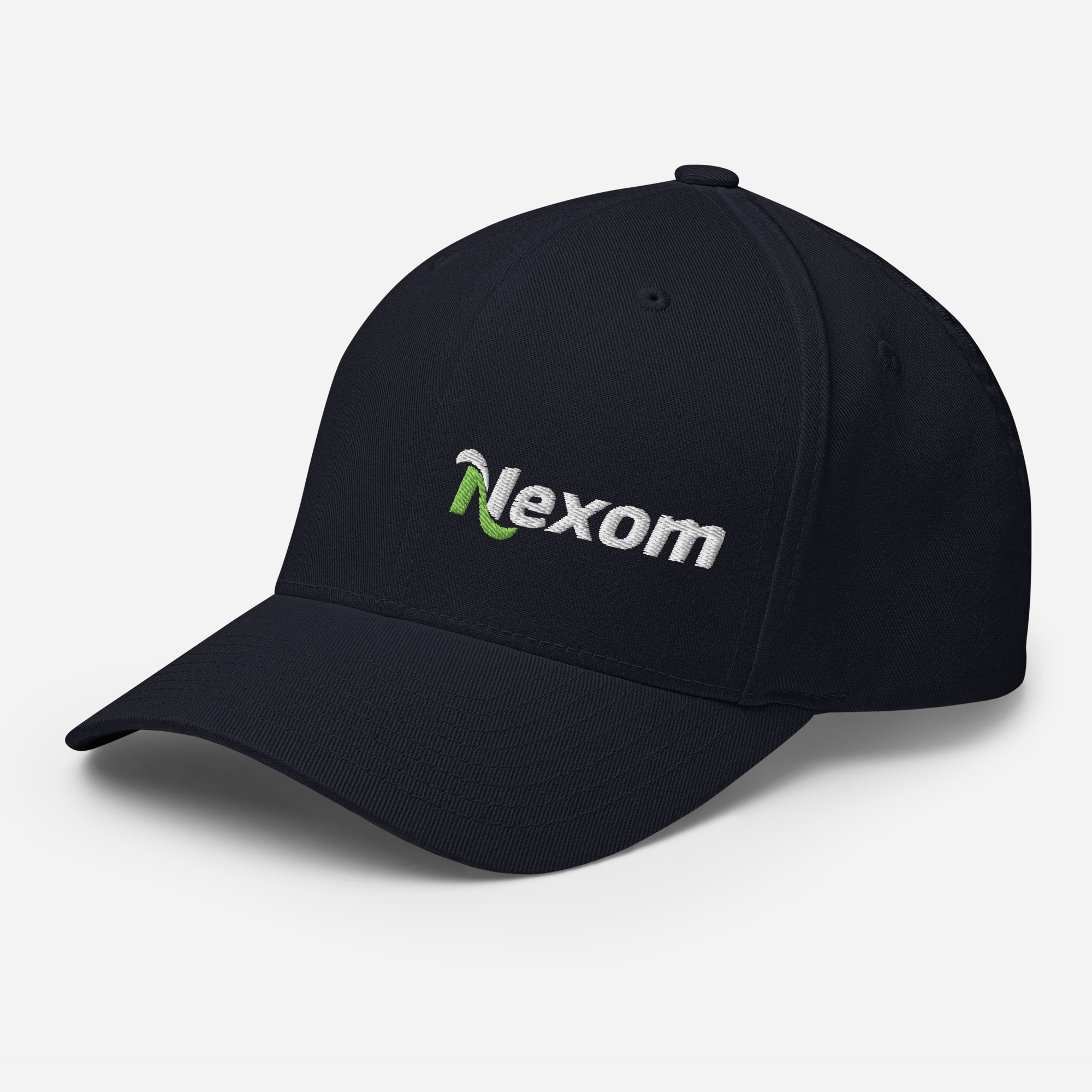 Side angle of closed-back Flexfit hat showing off-centre logo embroidery and curved visor in Dark Navy