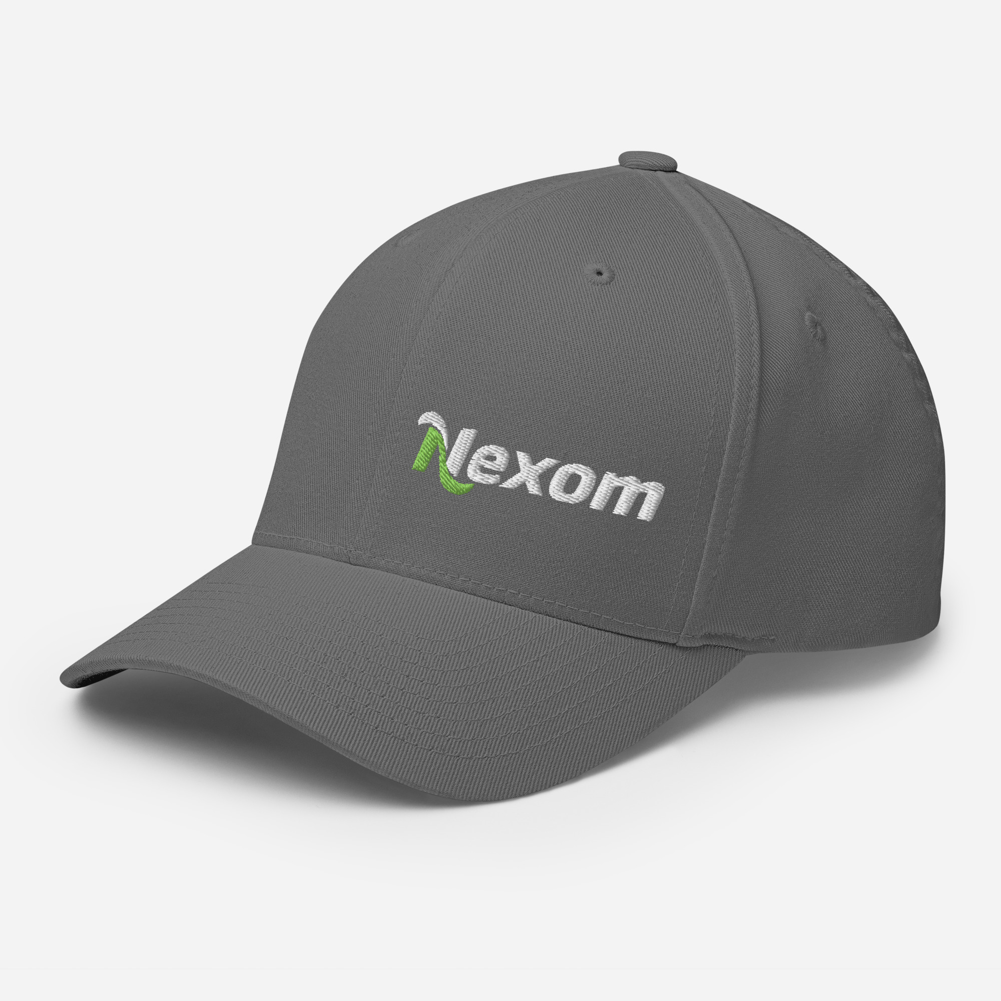 Side angle of closed-back Flexfit hat showing off-centre logo embroidery and curved visor in Grey