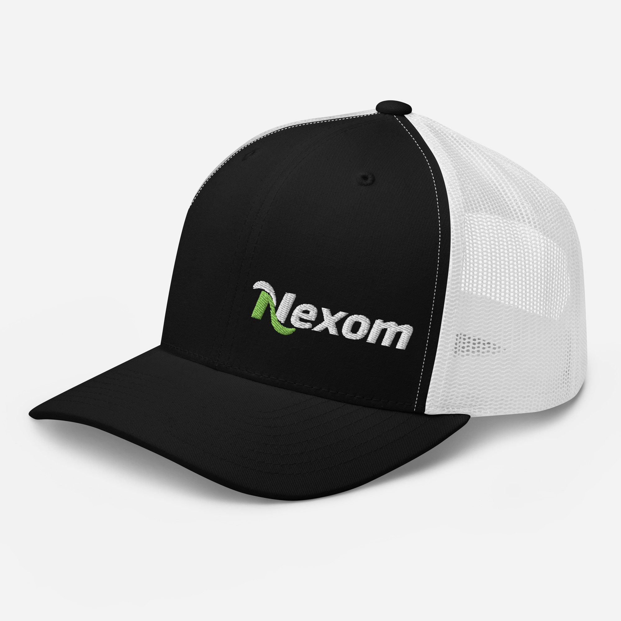 Side angle of structured trucker cap with left-placed logo and breathable mesh panel in Black and White