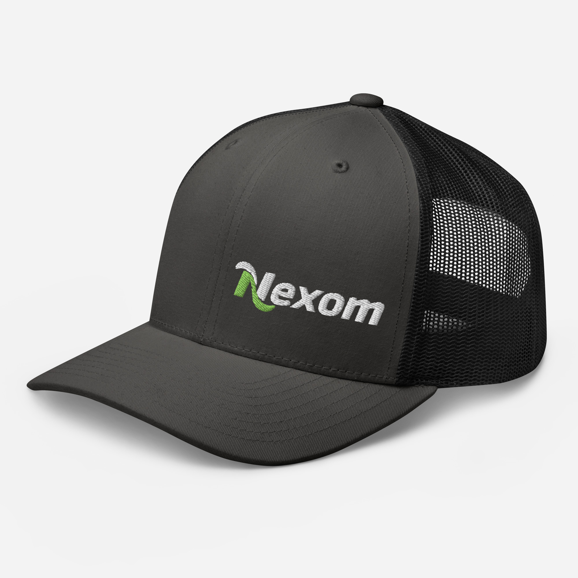 Side angle of structured trucker cap with left-placed logo and breathable mesh panel in Charcoal and black
